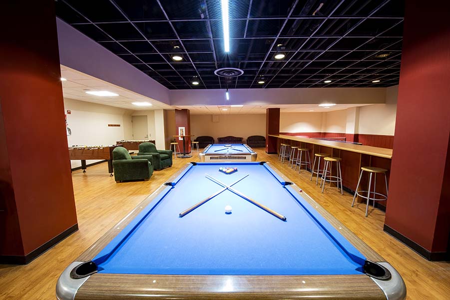 Photo of Scotland Yard Game Room showing pool tables and chairs